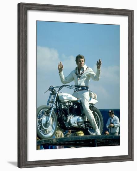 Motorcycle Daredevil Evel Knievel Poised on His Harley Davidson-Ralph Crane-Framed Premium Photographic Print