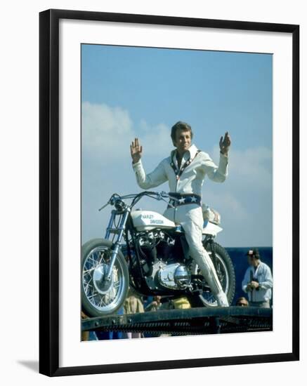 Motorcycle Daredevil Evel Knievel Poised on His Harley Davidson-Ralph Crane-Framed Premium Photographic Print