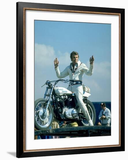 Motorcycle Daredevil Evel Knievel Poised on His Harley Davidson-Ralph Crane-Framed Premium Photographic Print