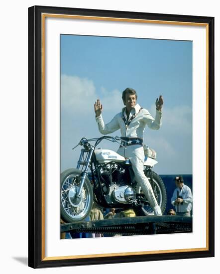 Motorcycle Daredevil Evel Knievel Poised on His Harley Davidson-Ralph Crane-Framed Premium Photographic Print