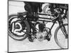 Motorcyclist Holding Rudge Motorcycle-null-Mounted Photographic Print