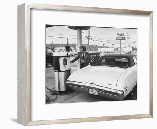 Motorist Filling Up His Own Car at a Self Service Gas Station-Ralph Morse-Framed Photographic Print