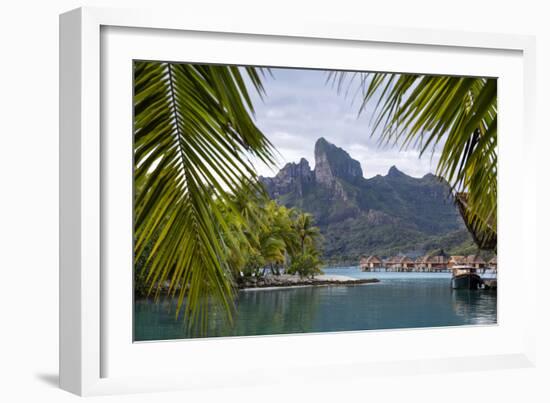 Mount Otemanu As Seen Through Palm Fronds At The Four Seasons Bora Bora. French Polynesia-Karine Aigner-Framed Photographic Print