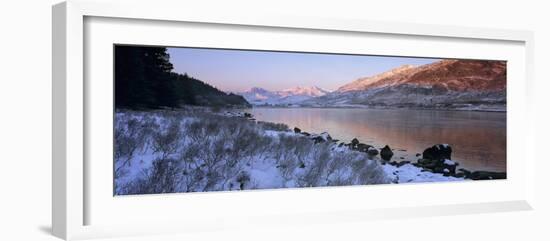 Mount Snowdon in snow at sunrise with frozen LLynnau Mymbyr lake, Capel Curig, Snowdonia-Stuart Black-Framed Photographic Print