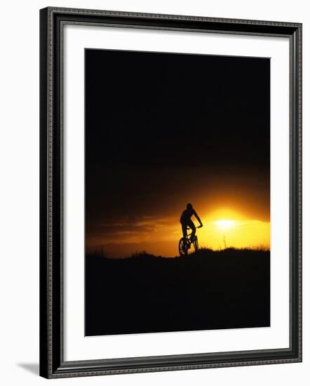 Mountain Biker Against Stormy Sunset, Fruita, Colorado, USA-Chuck Haney-Framed Photographic Print