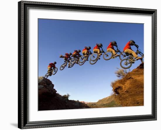 Mountain Biker Catches Air at Rampage Site near Virgin, Utah, USA-Chuck Haney-Framed Photographic Print