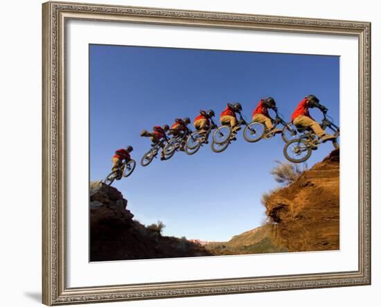 Mountain Biker Catches Air at Rampage Site near Virgin, Utah, USA-Chuck Haney-Framed Photographic Print