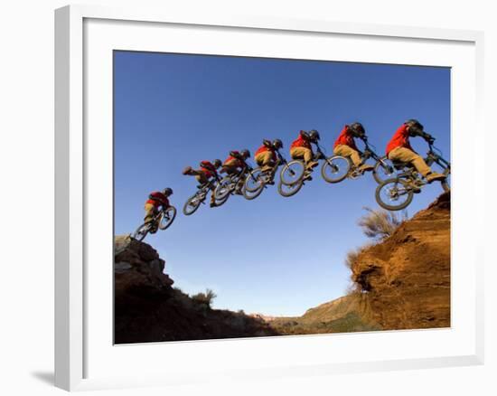 Mountain Biker Catches Air at Rampage Site near Virgin, Utah, USA-Chuck Haney-Framed Photographic Print