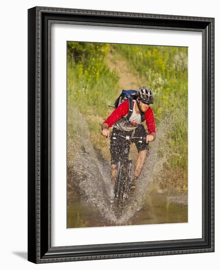 Mountain Biker Splashes Through Andrews Creek, Maah Daah Hey Trail in Medora, North Dakota, USA-Chuck Haney-Framed Photographic Print