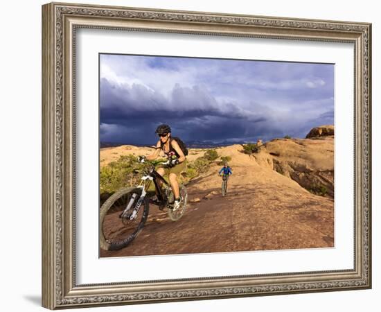 Mountain Bikers on the Slickrock Trail in Moab, Utah, Usa-Chuck Haney-Framed Photographic Print