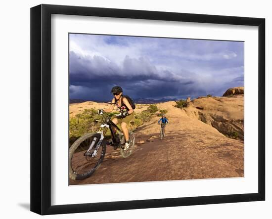 Mountain Bikers on the Slickrock Trail in Moab, Utah, Usa-Chuck Haney-Framed Photographic Print