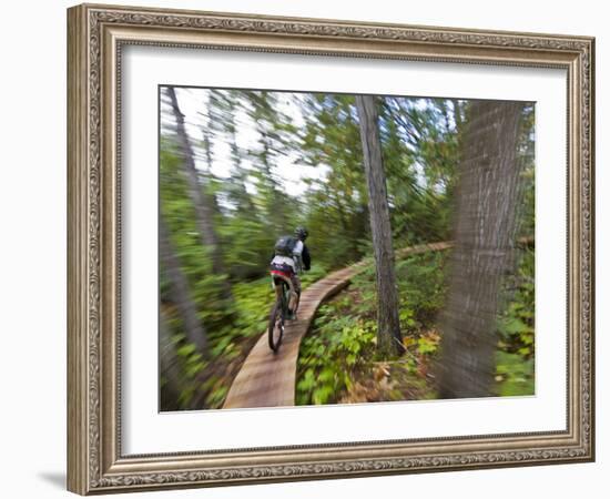 Mountain biking on the Stairway to Heaven Trail in Copper Harbor, Michigan, USA-Chuck Haney-Framed Photographic Print