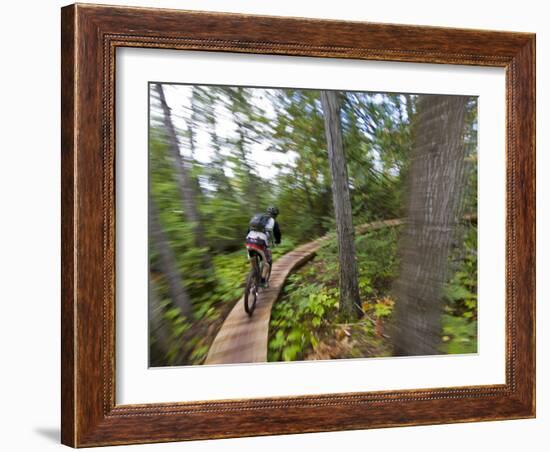 Mountain biking on the Stairway to Heaven Trail in Copper Harbor, Michigan, USA-Chuck Haney-Framed Photographic Print