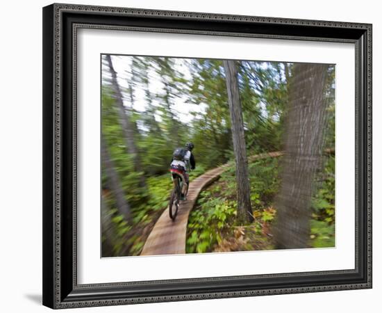 Mountain biking on the Stairway to Heaven Trail in Copper Harbor, Michigan, USA-Chuck Haney-Framed Photographic Print