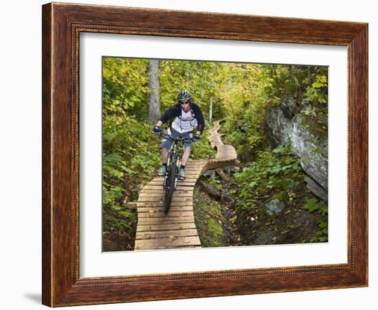 Mountain biking on the Stairway to Heaven Trail in Copper Harbor, Michigan, USA-Chuck Haney-Framed Photographic Print