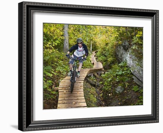 Mountain biking on the Stairway to Heaven Trail in Copper Harbor, Michigan, USA-Chuck Haney-Framed Photographic Print