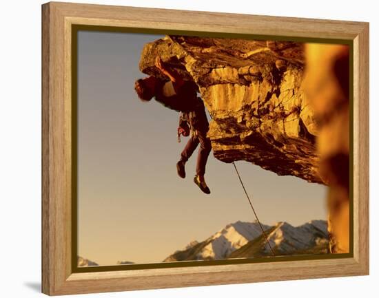 Mountain Climber Hanging from a Rock-null-Framed Premier Image Canvas