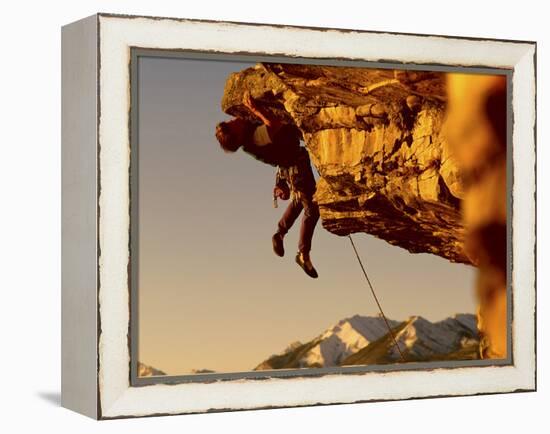 Mountain Climber Hanging from a Rock-null-Framed Premier Image Canvas