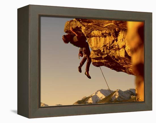 Mountain Climber Hanging from a Rock-null-Framed Premier Image Canvas