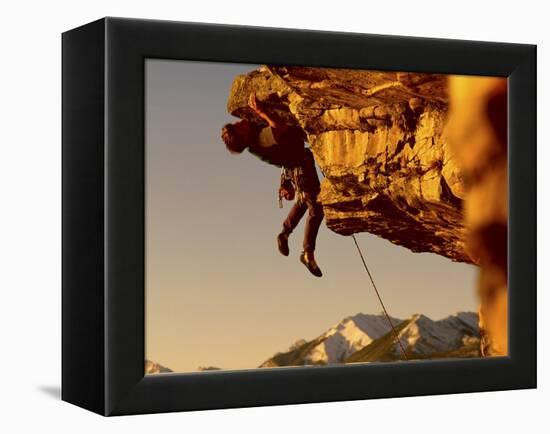 Mountain Climber Hanging from a Rock-null-Framed Premier Image Canvas