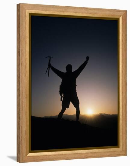 Mountain Climber Rejoices at the Summit at Sunrise-null-Framed Premier Image Canvas