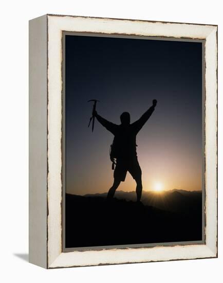 Mountain Climber Rejoices at the Summit at Sunrise-null-Framed Premier Image Canvas