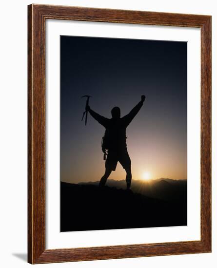 Mountain Climber Rejoices at the Summit at Sunrise-null-Framed Photographic Print