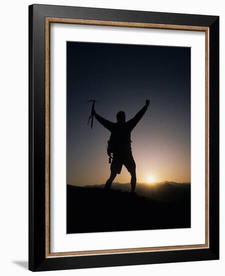 Mountain Climber Rejoices at the Summit at Sunrise-null-Framed Photographic Print