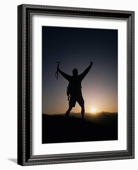 Mountain Climber Rejoices at the Summit at Sunrise-null-Framed Photographic Print