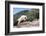 Mountain Goat Climbing Rocks in Glacier National Park, Montana-James White-Framed Photographic Print