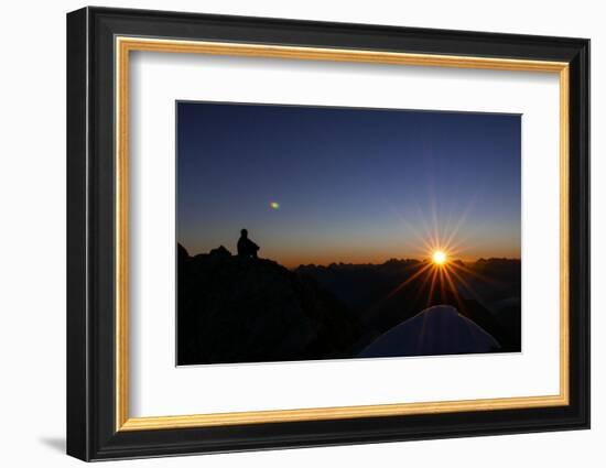 Mountaineer Admires Sunrise and Sunrays-Rolf Roeckl-Framed Photographic Print