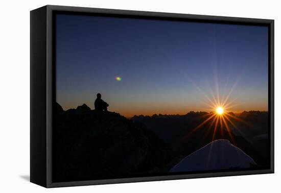 Mountaineer Admires Sunrise and Sunrays-Rolf Roeckl-Framed Premier Image Canvas