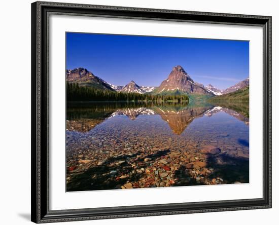 Mountains Reflect into Calm Two Medicine Lake, Glacier National Park, Montana, USA-Chuck Haney-Framed Photographic Print