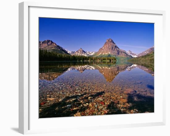 Mountains Reflect into Calm Two Medicine Lake, Glacier National Park, Montana, USA-Chuck Haney-Framed Photographic Print