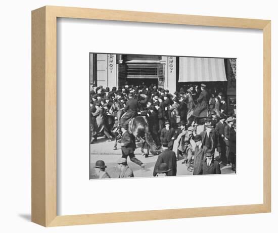 Mounted police disperse a crowd, Union Square, New York City, USA, late 19th or early 20th century-Unknown-Framed Photographic Print