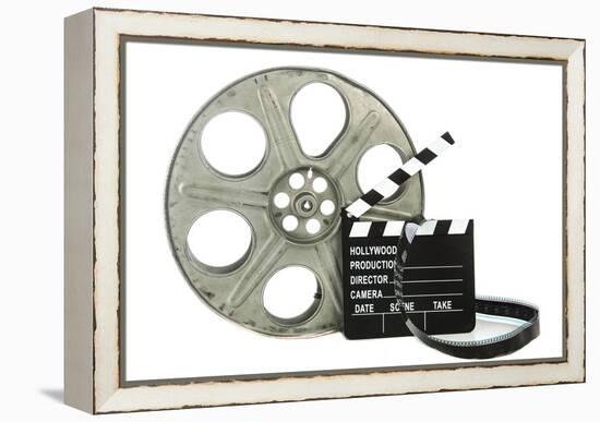 Movie Clapper Board With Film Reel On White Background-Steve Collender-Framed Stretched Canvas