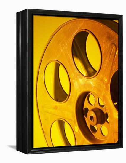 Movie Film and Reels in Yellow Light-null-Framed Premier Image Canvas