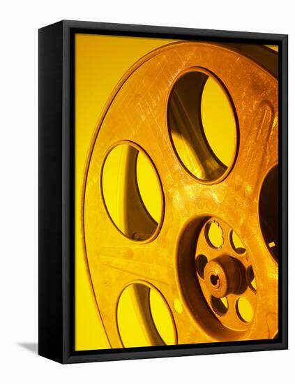 Movie Film and Reels in Yellow Light-null-Framed Premier Image Canvas