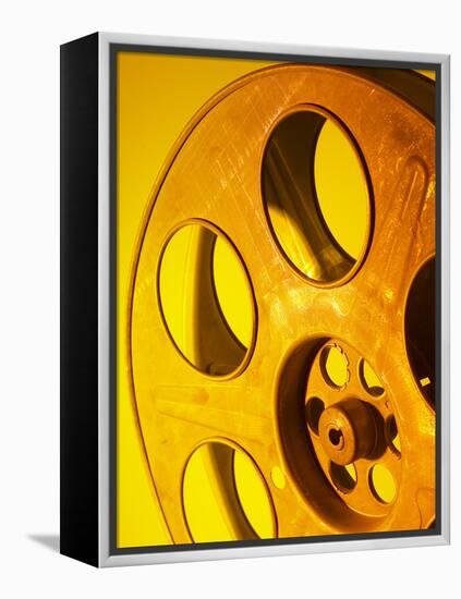 Movie Film and Reels in Yellow Light-null-Framed Premier Image Canvas