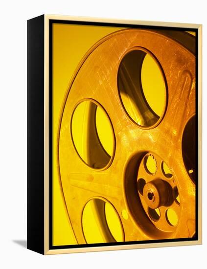 Movie Film and Reels in Yellow Light-null-Framed Premier Image Canvas