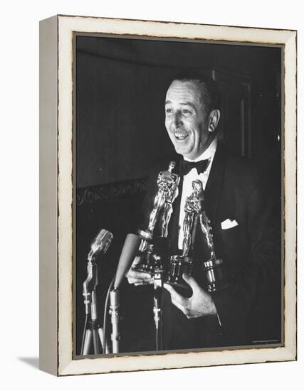 Movie Producer Walt Disney Holding Four Oscar Awards He Won-George Silk-Framed Premier Image Canvas