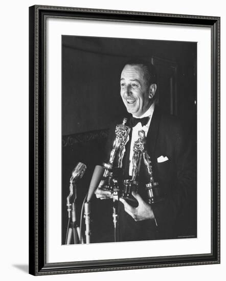 Movie Producer Walt Disney Holding Four Oscar Awards He Won-George Silk-Framed Premium Photographic Print