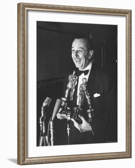 Movie Producer Walt Disney Holding Four Oscar Awards He Won-George Silk-Framed Premium Photographic Print