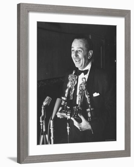 Movie Producer Walt Disney Holding Four Oscar Awards He Won-George Silk-Framed Premium Photographic Print