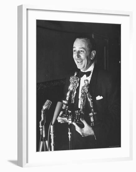 Movie Producer Walt Disney Holding Four Oscar Awards He Won-George Silk-Framed Premium Photographic Print