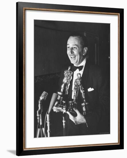 Movie Producer Walt Disney Holding Four Oscar Awards He Won-George Silk-Framed Premium Photographic Print