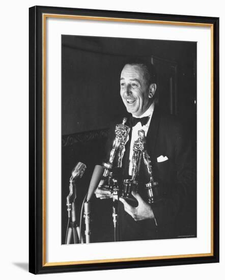 Movie Producer Walt Disney Holding Four Oscar Awards He Won-George Silk-Framed Premium Photographic Print