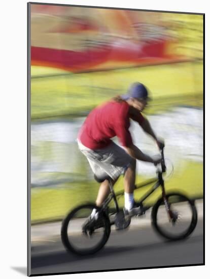 Moving Bicycle and Rider-null-Mounted Photographic Print