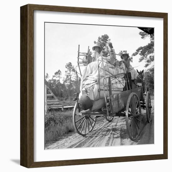 Moving day in the turpentine pine forest of North Florida, 1936-Dorothea Lange-Framed Photographic Print