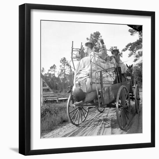 Moving day in the turpentine pine forest of North Florida, 1936-Dorothea Lange-Framed Photographic Print